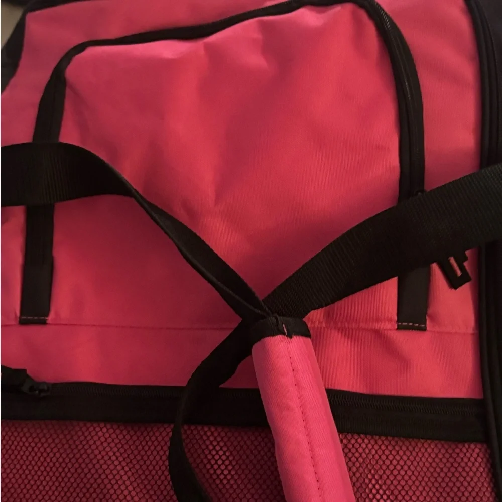 Pink and Black Garment Bag with Wheels 30” long• 16” wide• 14” high